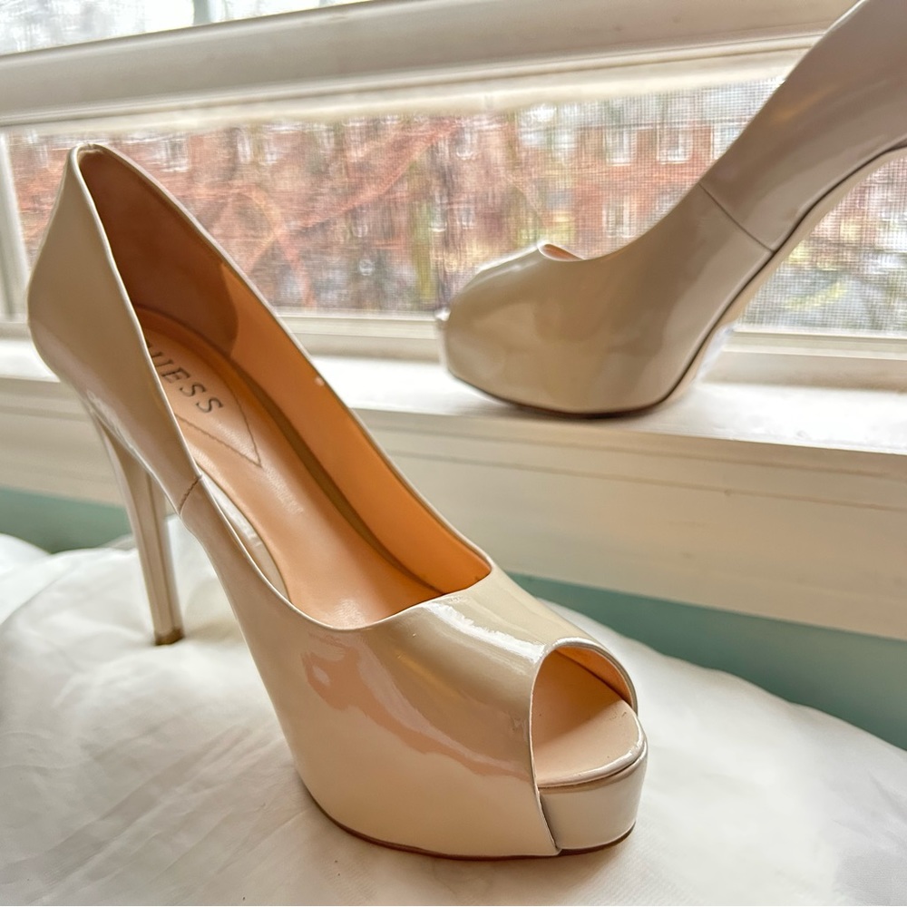 GUESS open toe platform heel in nude with glossy finish.